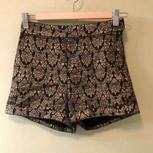 Patterned black and gold shorts